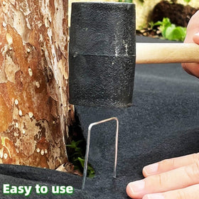 YANEYRIE landscape fabric and tarp anchors securing materials in place