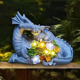 Yardancer dragon statue outdoors nestled among succulents for charm.