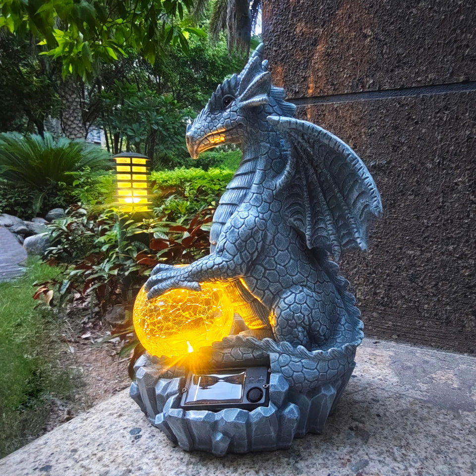 Yardancer dragon solar garden statue outdoors with glowing orb for elegant dusk ambiance