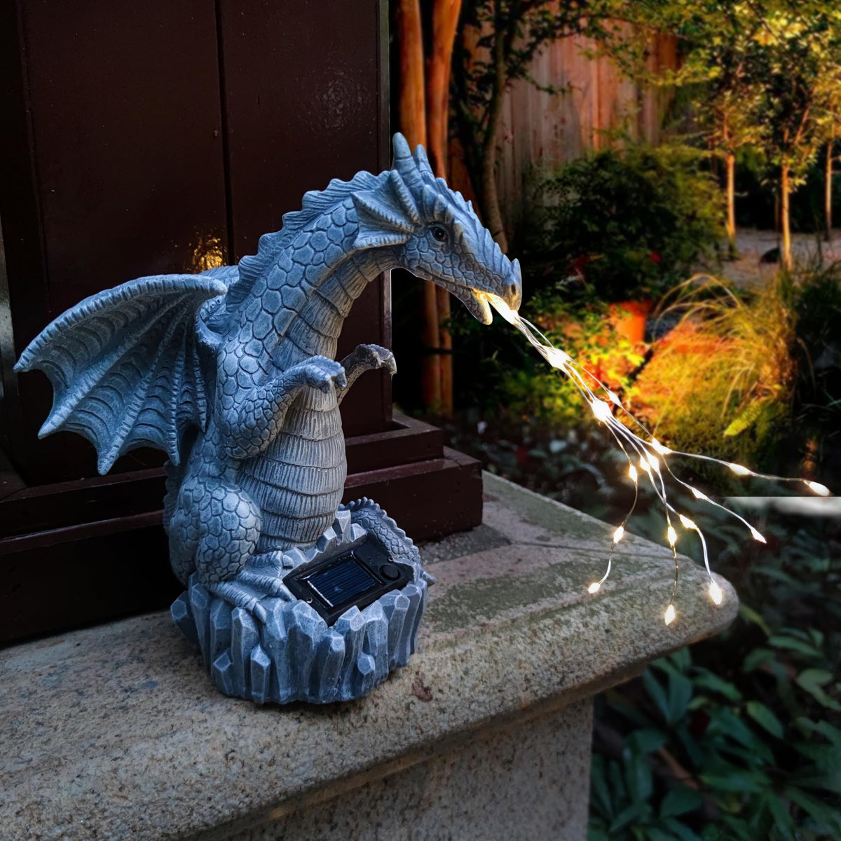 Yardancer dragon yard ornament accenting a front door area
