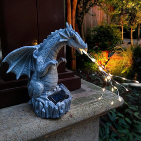 Yardancer dragon yard ornament accenting a front door area