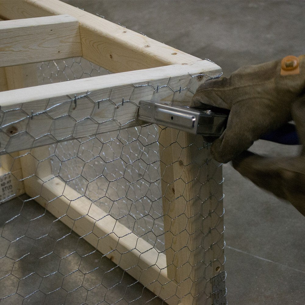 YARDGARD 2-Inch mesh fence for garden protection and airflow.