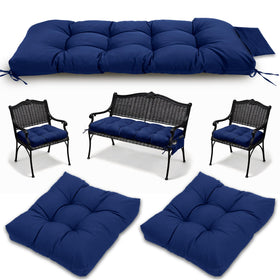 Yddsky 3pc wicker cushions on navy bench seat for outdoor comfort.