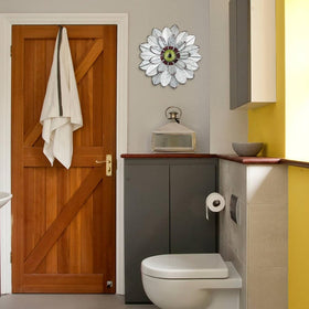 YEAHOME metal flower wall decor outdoor-ready finish withstands weather while brightening porches.