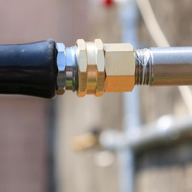 YELUN brass female-to-female adapter ready for hose repairs.