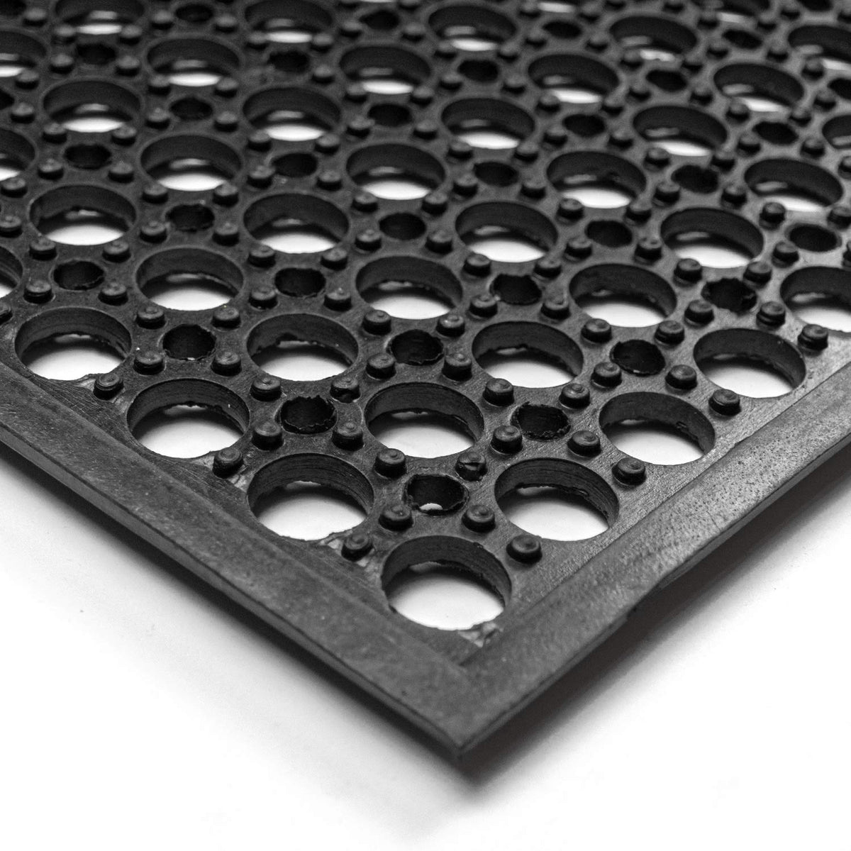 Yesland door mat easy to clean with hose, brush, and detergent.
