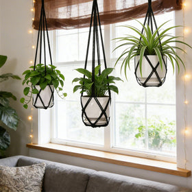 YIBOT macrame hanger with three hooks for versatile plant arrangements.