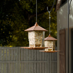 Seed tray with guardrails on Yieach Hopper Bird Feeder prevents spill