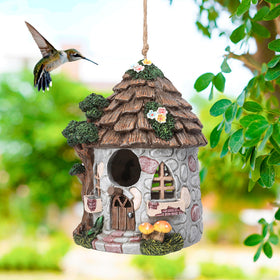 Close-up of Yinns resin bird house showing natural colors and sturdy build