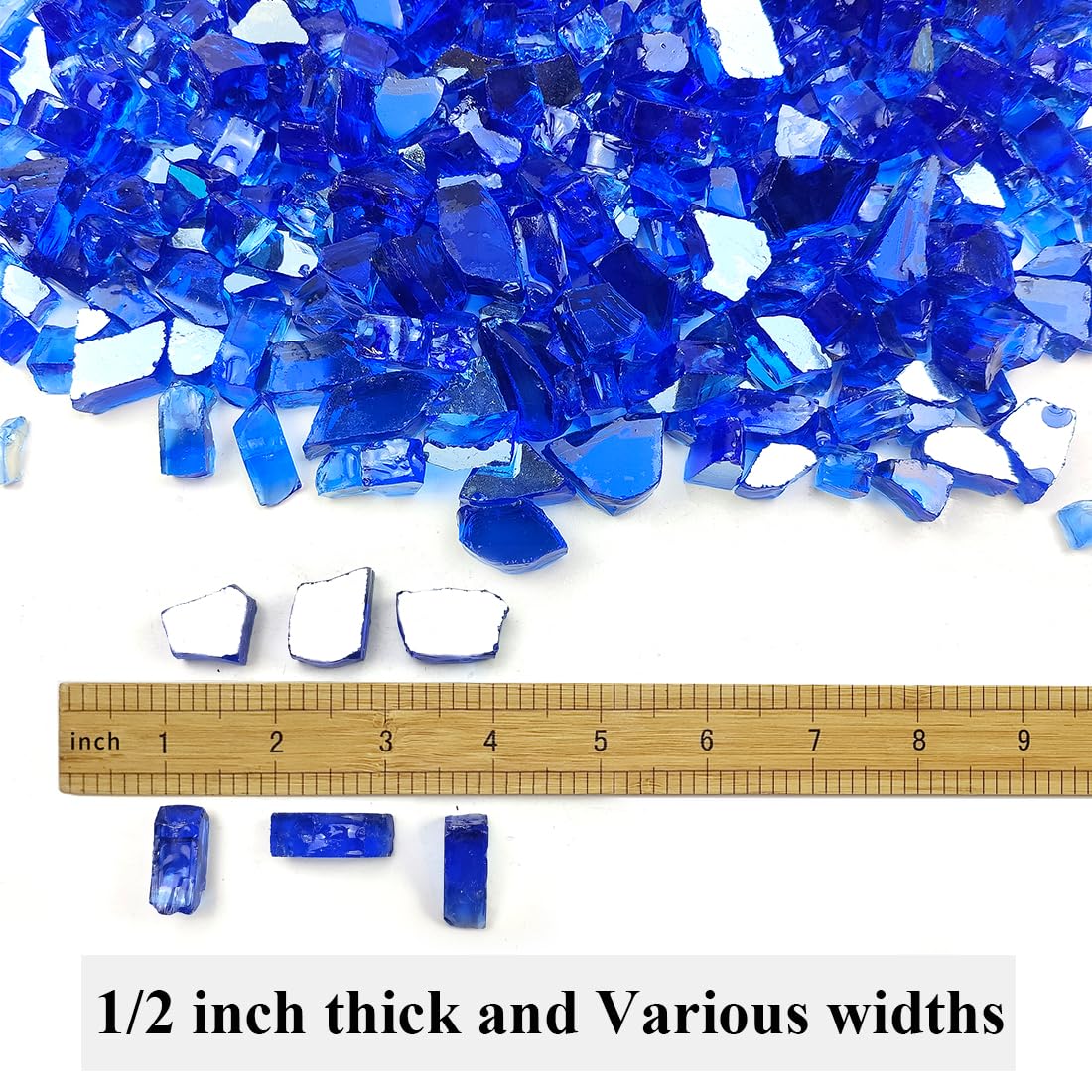 Closeup of YISZM cobalt blue fire glass shimmering with flames.