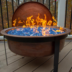 Landscape accent using YISZM blue fire glass adds dramatic night-time lighting.