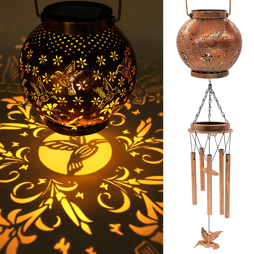 YJFWAL hummingbird solar lantern casts warm garden glow at dusk