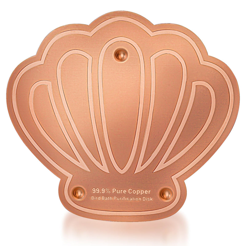 Yncotte copper bird bath disk improves water safety for visiting birds.