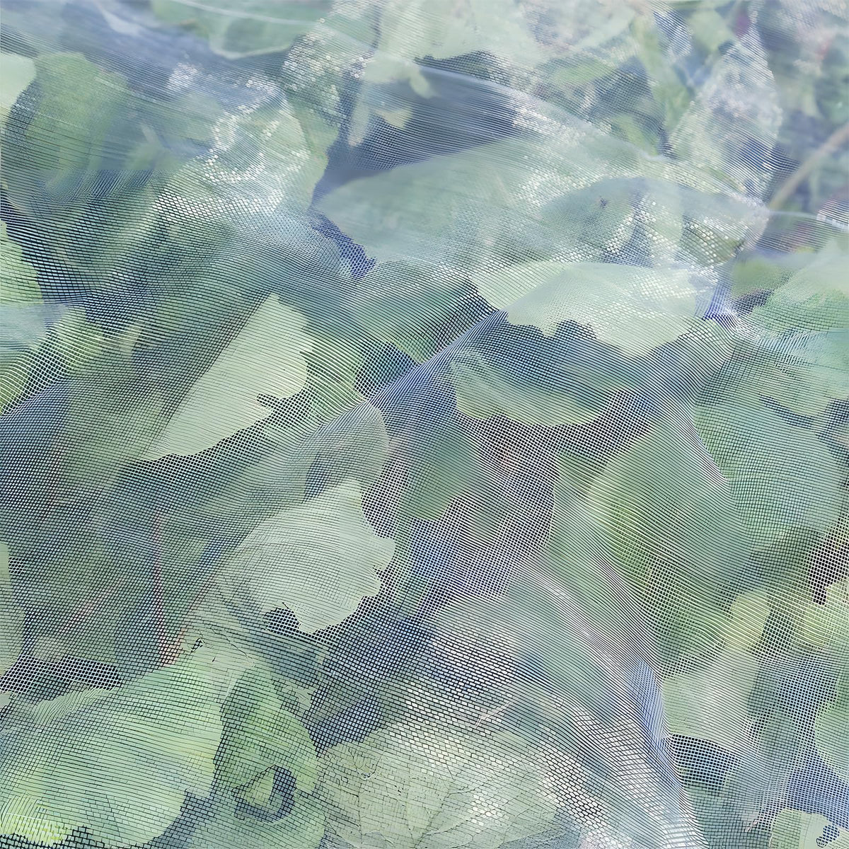 YNERHAI easy-drape garden netting secured with stones