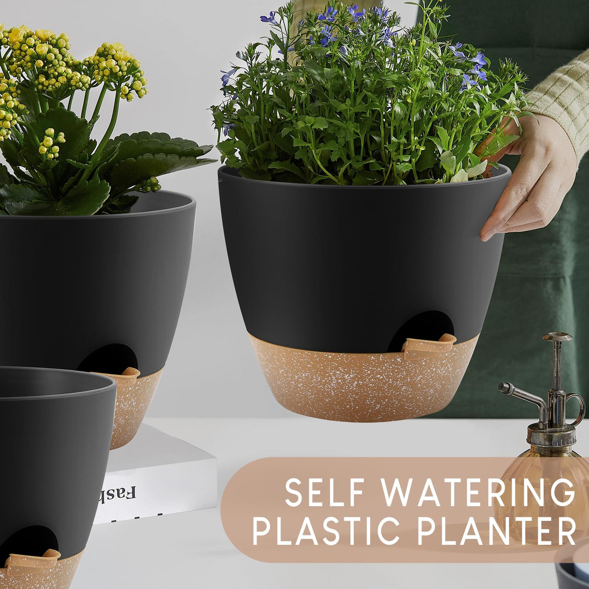 YNNICO black self-watering planter adds modern style to any living space.