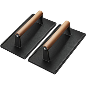 Yoehka cast iron grill press over bacon showing crisp sear and even pressure