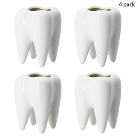 YOFIT white tooth planters serve as stylish desk organizers.