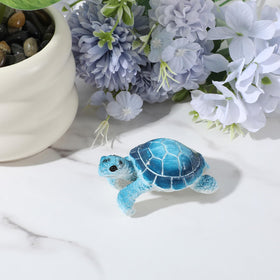 Yolev blue turtle decor hugs pots for elegant edges.