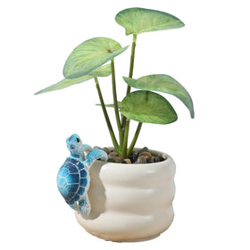 Yolev sea turtle planter charm for fences and railings.