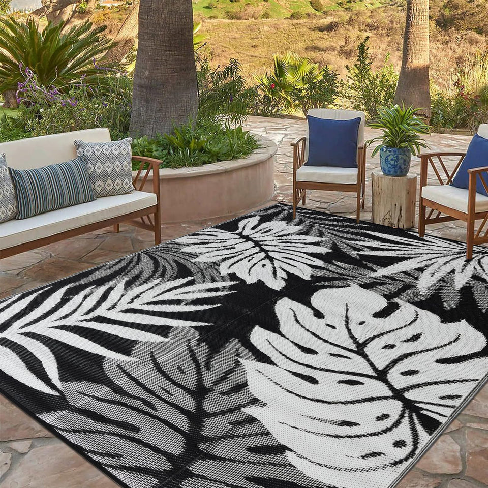 YONILE Outdoor Rug folds compactly for portable patio and beach use.