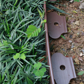 Yowlieu edging roll installed along flower bed edge