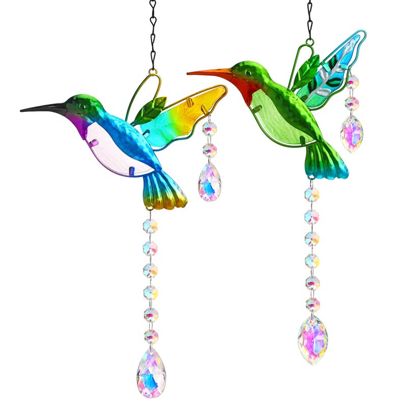 YU FENG hummingbird suncatcher over a sunlit window creating dancing rainbow colors.