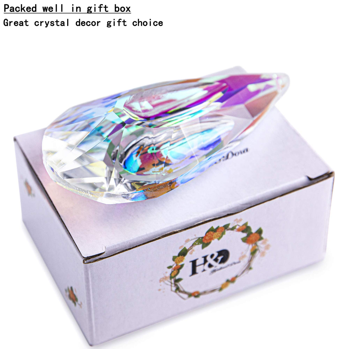 YU FENG hanging prism decor swirls colors across walls.