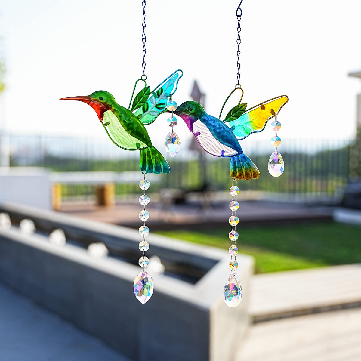 YU FENG window suncatcher displayed to enhance daylight light play.