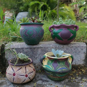 Yuccasly gift-ready ceramic pots offer contemporary design and practicality.