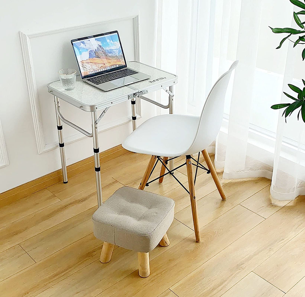 YUFIFAIRY folding table shows adjustable-height legs for versatile setup