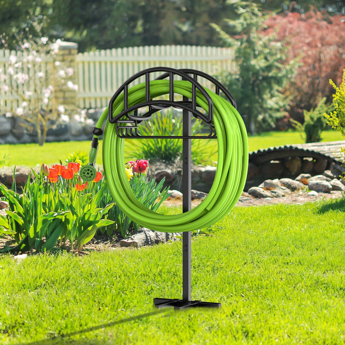 Outdoor yard hose organization with Yumatum hose storage system.