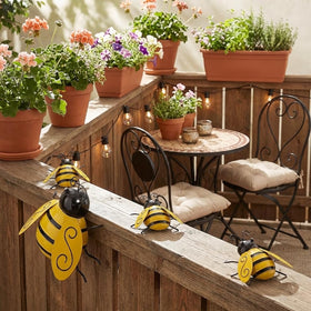 Yungeln large metal bee wall art makes a bold outdoor statement.