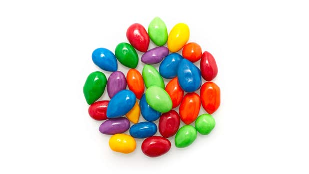 Yupik Kimmie Sunbursts milk chocolate coating on sunflower seeds, ideal for gifts.