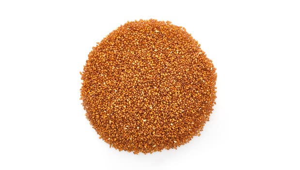 Close-up of Yupik Teff seeds texture with mildly nutty flavor for tasty meals.