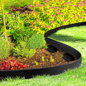 YUYIUS edging withstands sun and rain in an outdoor garden setting.