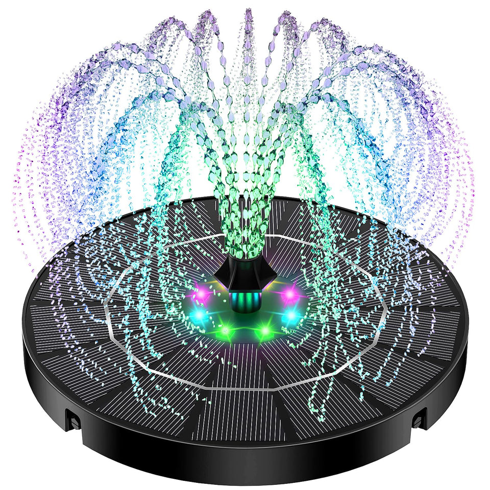 Yzert solar fountain in a bird bath with color-changing lights for evening ambiance