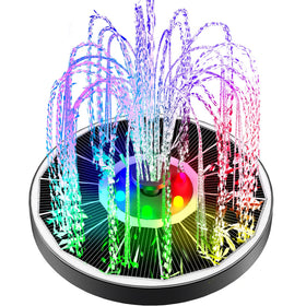 Yzert solar fountain glass panel with colorful LEDs for nighttime garden illumination.