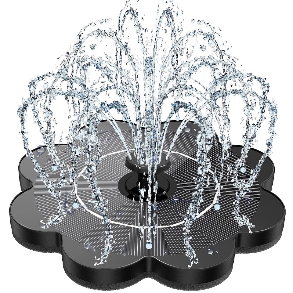 Yzert Solar Fountain with petal glass panel blending into garden flowers