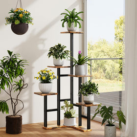 Yzosvki corner plant stand in living room shows space-efficient layout.