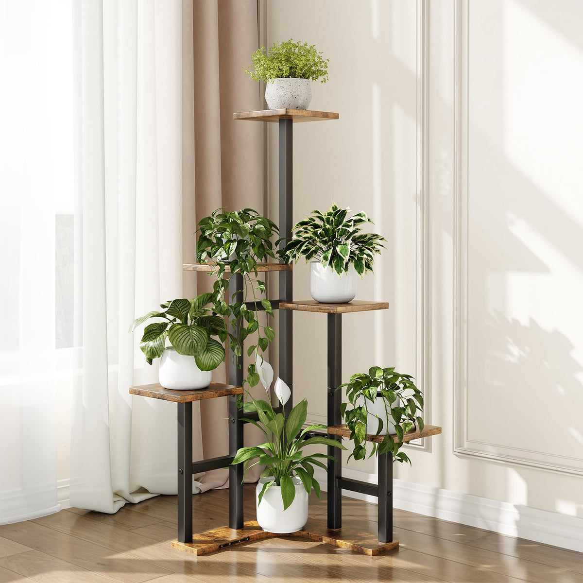 Yzosvki corner plant stand used for photos or decor items.