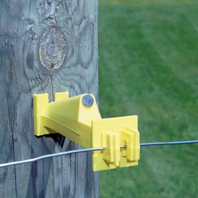 Close-up of the 5-inch extension keeping wire off the wooden post.