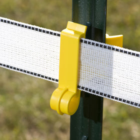 Zareba yellow insulator on a T-post, easy installation and arcing protection