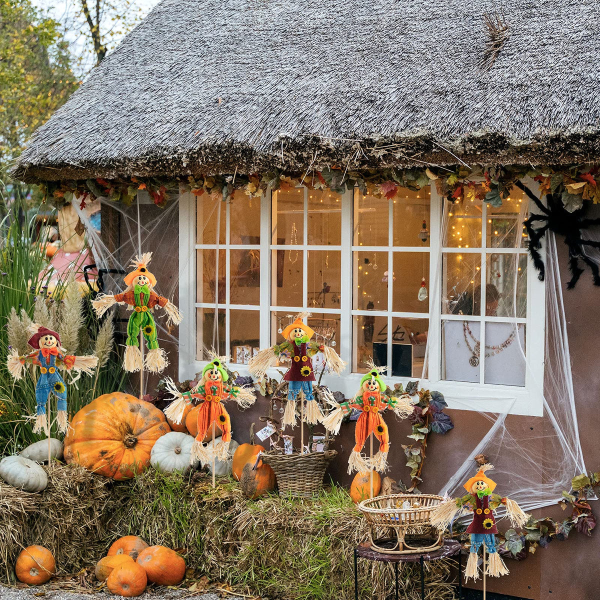 ZAUGONTW harvest scarecrow front view adds charming autumn ambiance to yards.