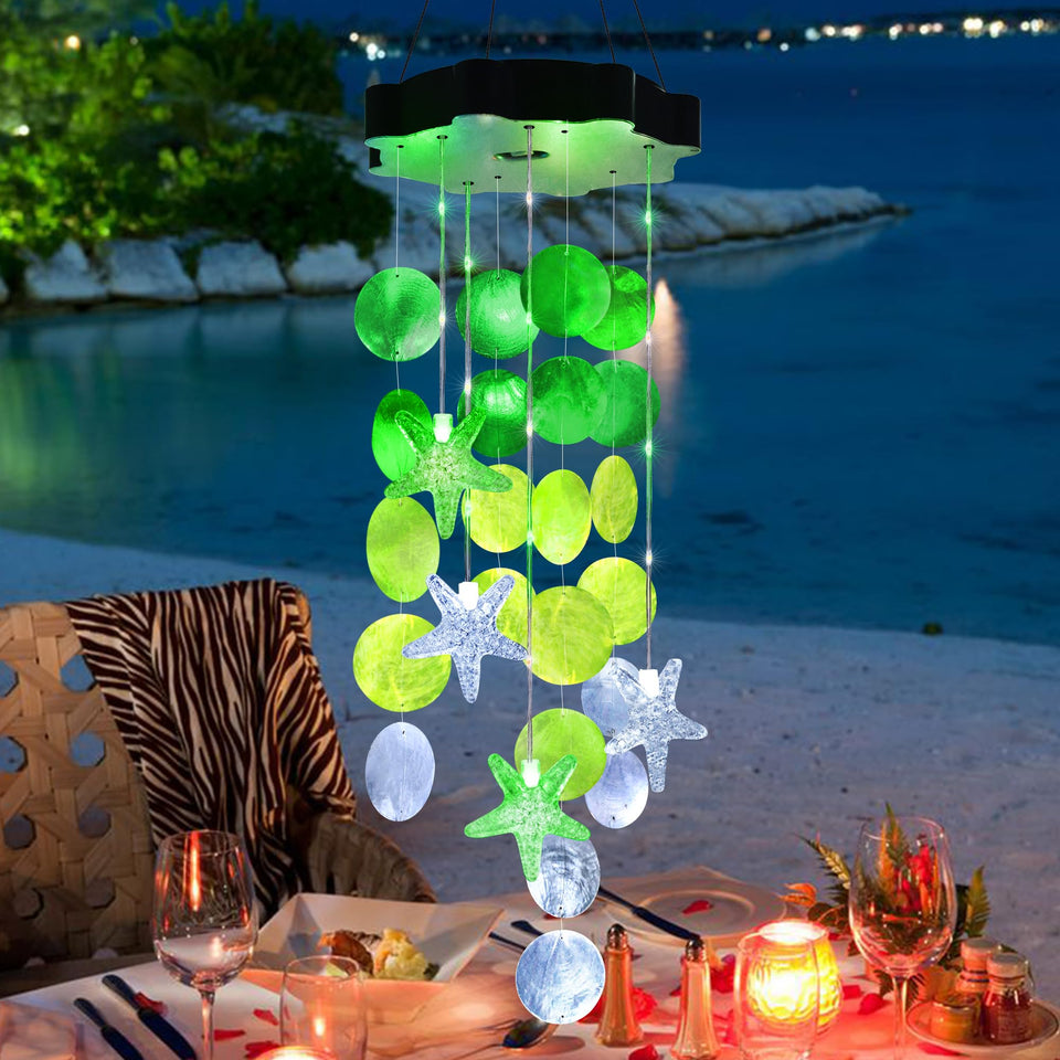 Zeiliuled Solar Shell Wind Chime glows in the outdoor garden at dusk.