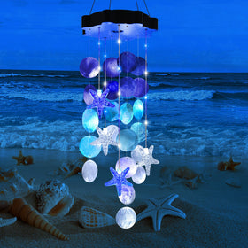Zeiliuled Solar Shell Wind Chimes in outdoor garden, glowing softly for ambient evening ambiance.
