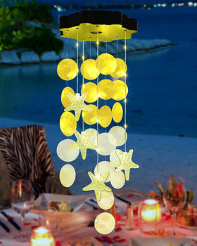 Zeiliuled Solar Shell Wind Chimes illuminate outdoor spaces with warm white light.