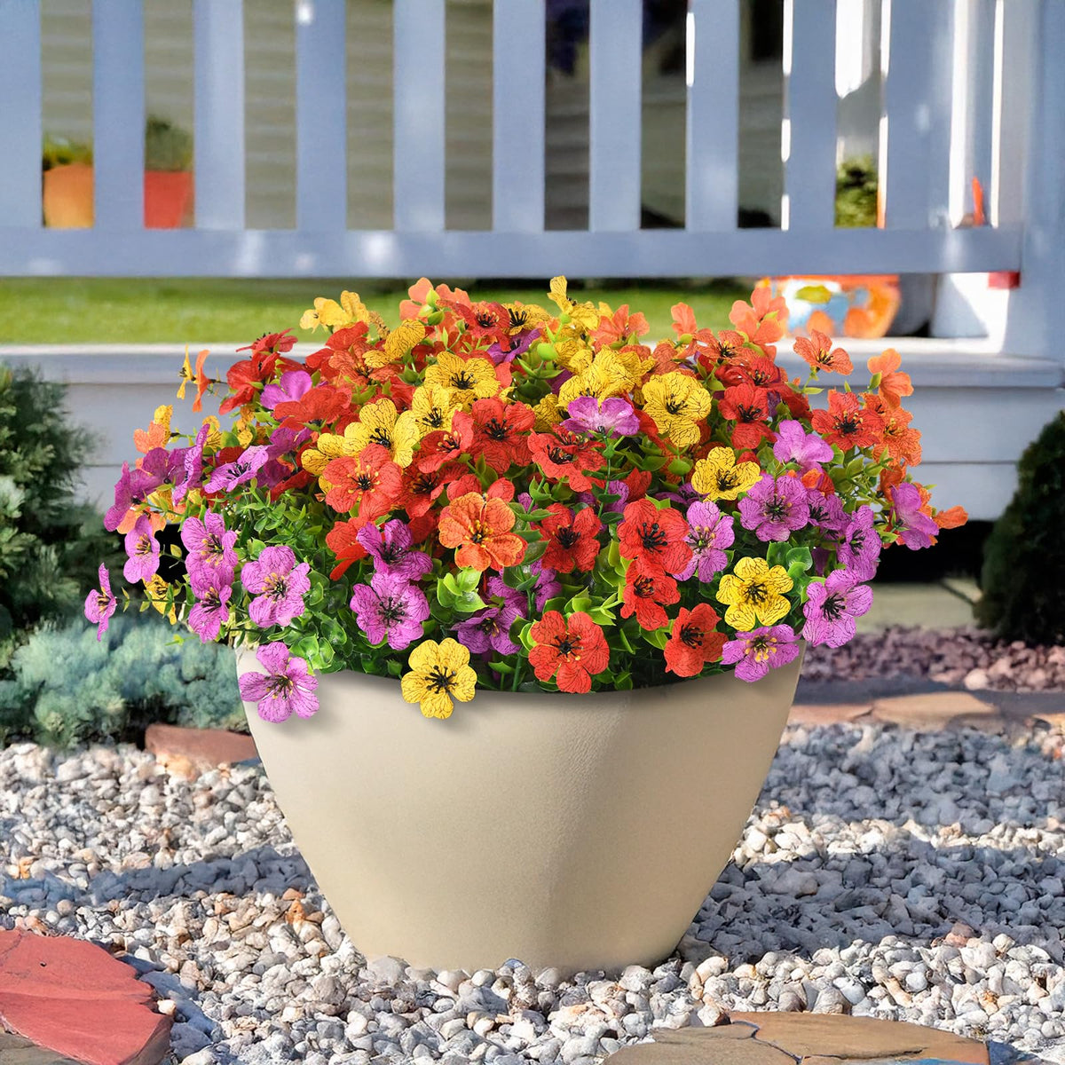 ZFProcess multicolor daisy arrangement adds seasonal charm to outdoor entryways.