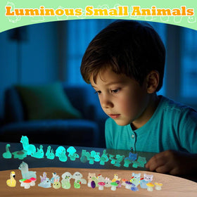 ZITU ISCHYROS tiny ducks and dogs add playful accents to terrariums.