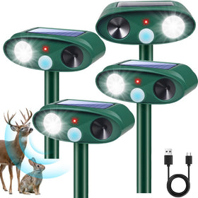 ZLieatmp Sonic Fortress Pro deer repellent in action deterring deer from garden at night.