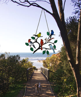 ZUAJITER handmade metal pendants showcase craft details and vibrant double-sided paint
